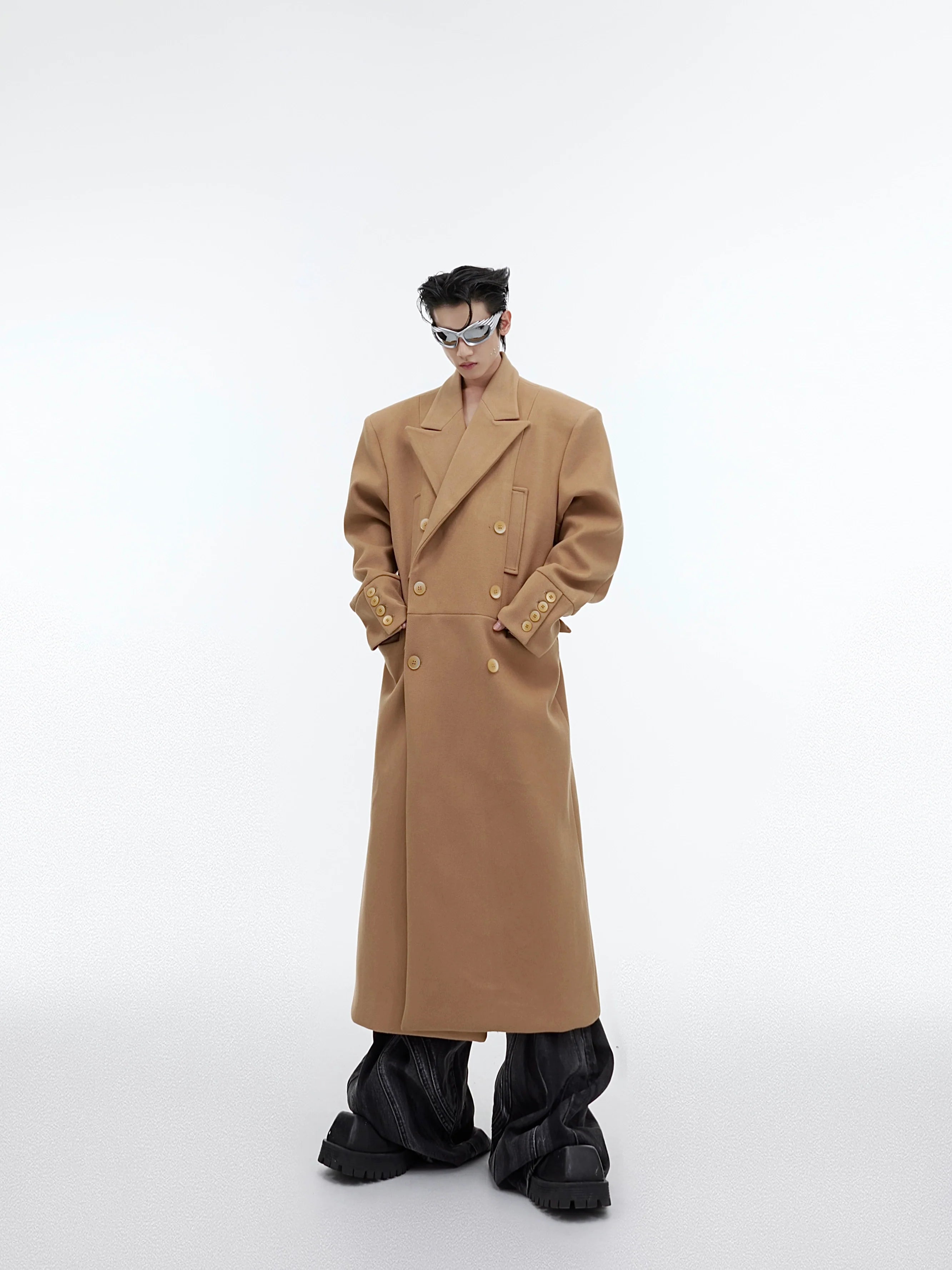 Oversized shoulder wool trench coat with structured silhouette, perfect for streetwear fashion looks