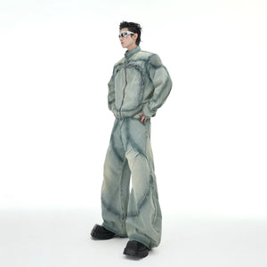 Close-up of the distressed details and vintage wash on this limited edition denim jacket set with functional zipper