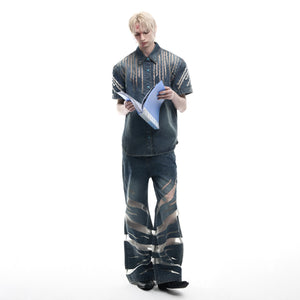 Lifestyle shot of the mesh denim co-ord set in an urban setting