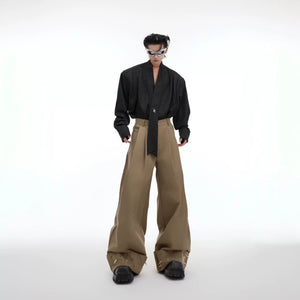 Back view of loose-fit streetwear trousers with clean tailoring.
