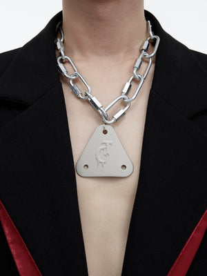 Male model wearing the metal triangle pendant punk necklace
