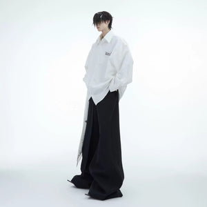 Black streetwear shirt with metallic flame and drop shoulder design