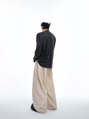 Rear view showing the oversized silhouette and center back vent