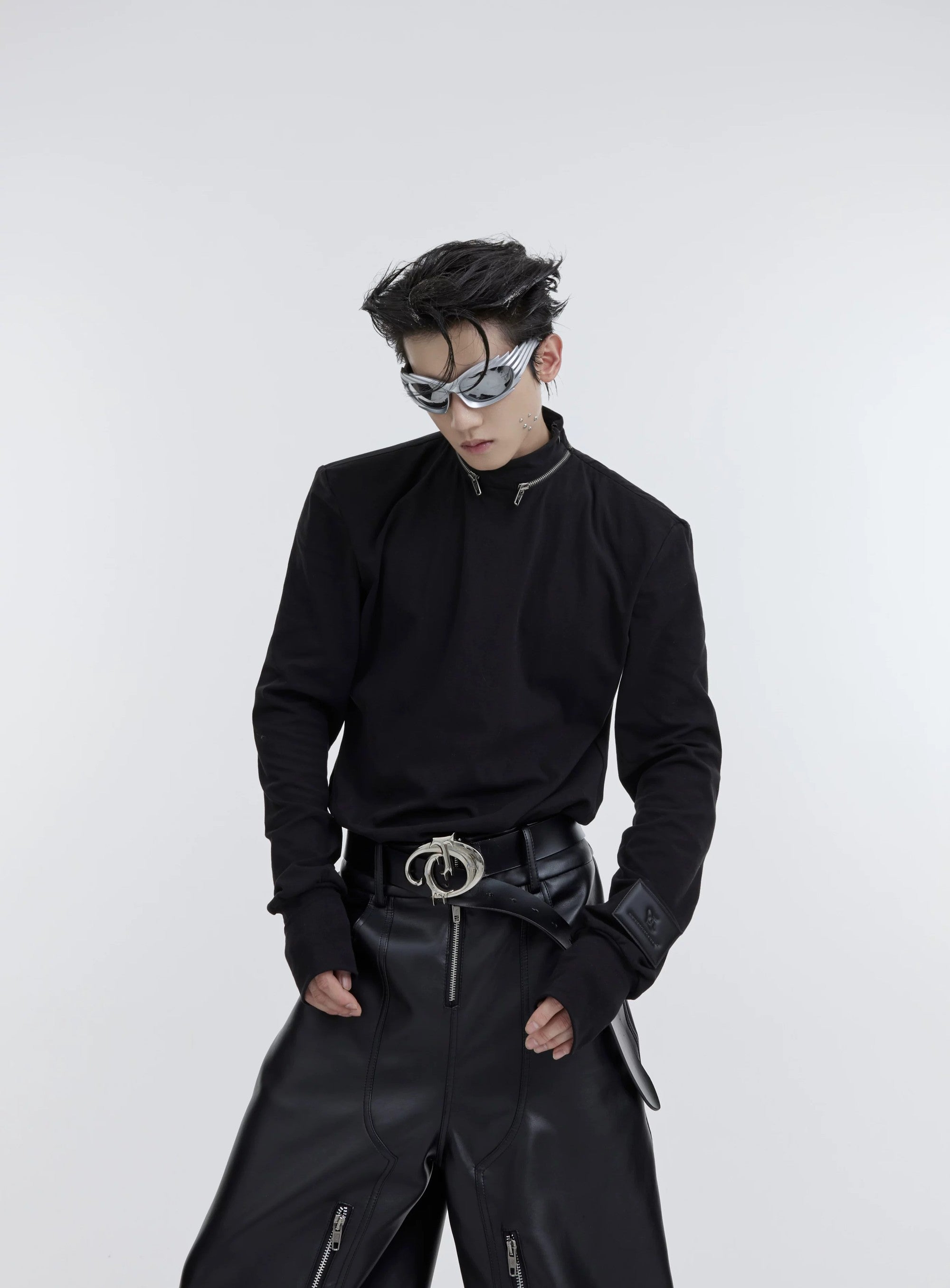 Slim fit mock neck streetwear top with metal hardware and padded shoulders