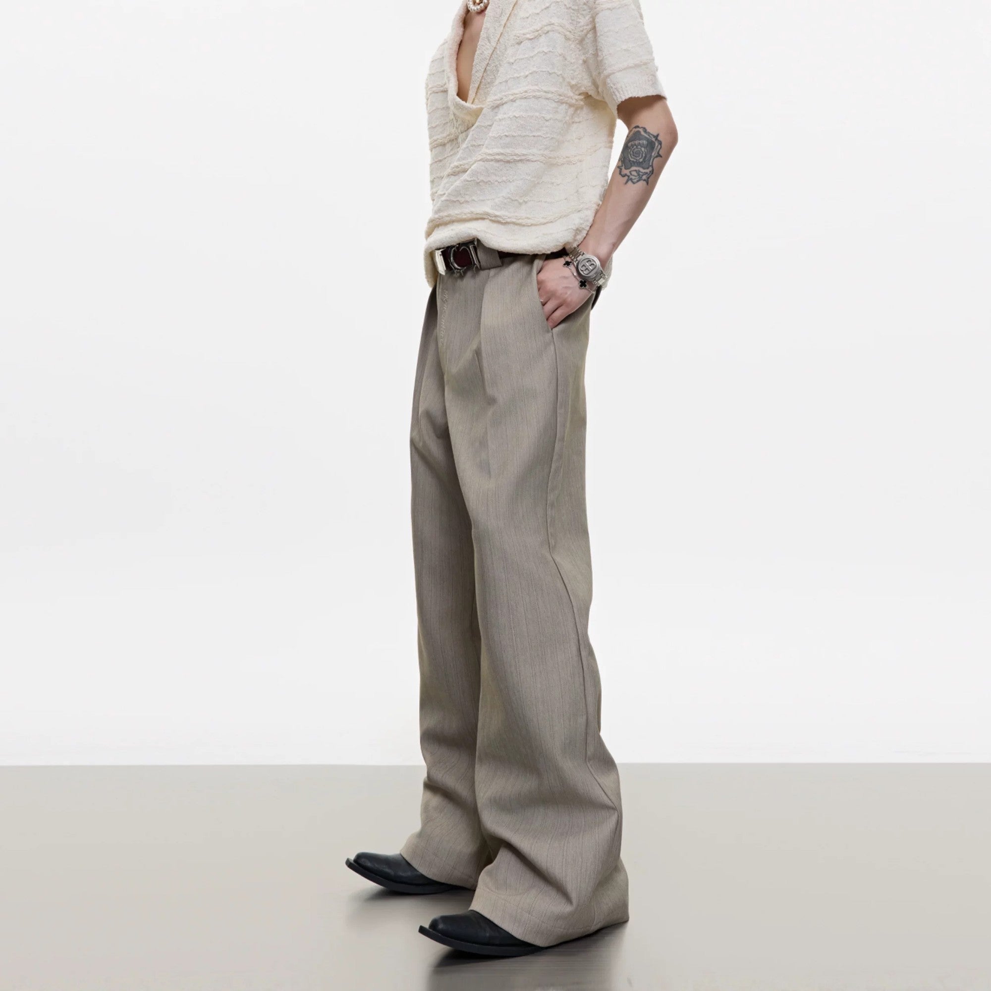 Men's loose fit flared trousers in brown with vintage old money aesthetic