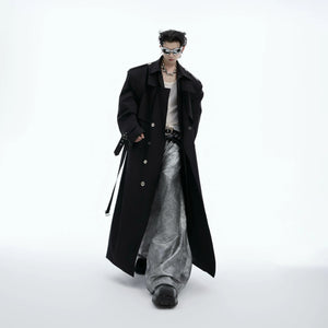 Close-up of the deconstructed shoulder padding and lapel design.