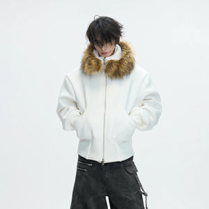 Model wearing oversized fake two-piece hoodie in a street setting