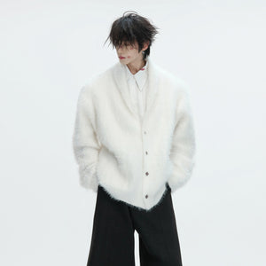 Front view of an oversized faux mink knit sweater in striped streetwear style