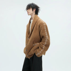 Model wearing a baggy faux mink knit sweater for a relaxed street look