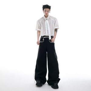 Detailed shot of the electroplated metal buckle and tie-cord accent