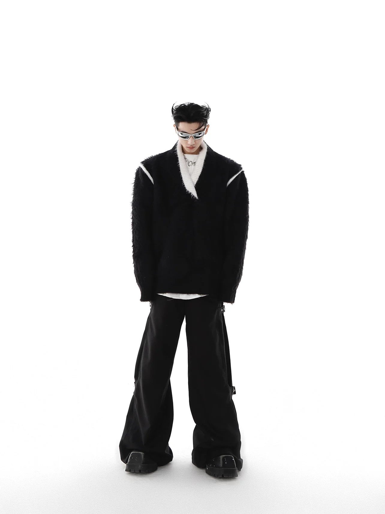 Stylized black faux mink fur sweater with drop shoulders