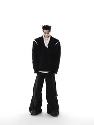 Stylized black faux mink fur sweater with drop shoulders