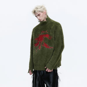 Black patchwork sweater with pearl details and mock neck