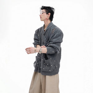 Back view of grey oversized distressed knit sweater for men