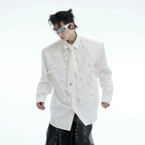 Oversized white shirt with built-in tie and pearl accents front view