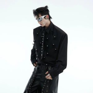 Internal view of detachable shoulder pads on black shirt