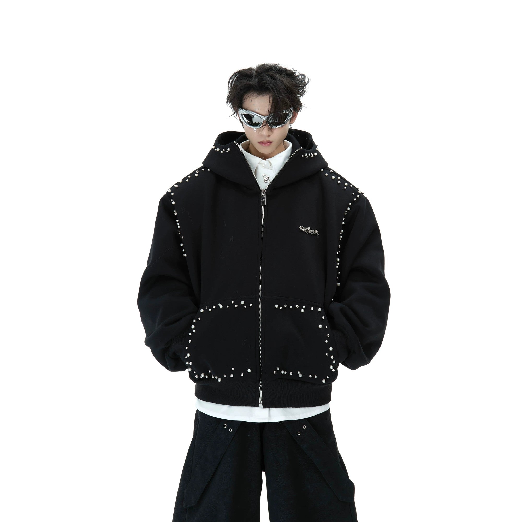 Model wearing a gray oversized hoodie with pearl hood detailing