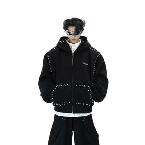 Model wearing a gray oversized hoodie with pearl hood detailing