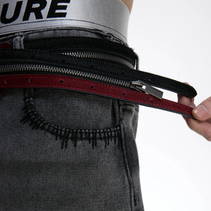 Detailed texture of top grain cowhide and pony hair on a streetwear belt