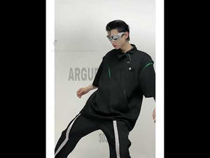 360-degree video showing all angles of this asymmetrical collar polo shirt with metal button details