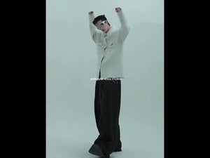 Video showcasing the premium silver mink fleece sweater with metal trim details and oversized streetwear design