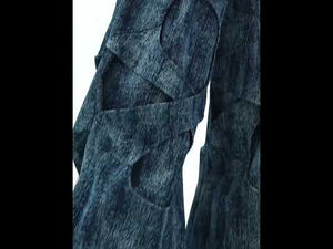 360-degree video showcase of textured patchwork denim pants with pearl accents and distressed details