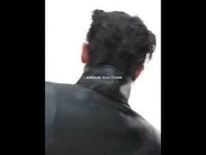 360-degree video showcase of premium deconstructed leather jacket with metal accents and asymmetrical design