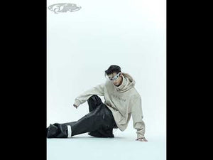 360-degree video showing the distressed hoodie with glitter-trim collar from all angles