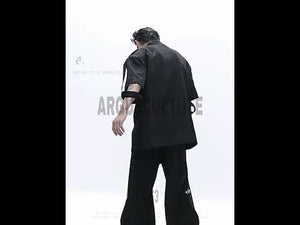 Video demonstrating how the metallic sleeveless jacket's iridescent fabric changes color with movement