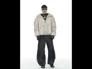 Video demonstrating how the two-way reversible hooded puffer jacket transforms between leather and fleece sides