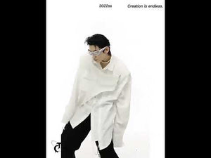 Video showcasing the unique deconstructed shoulder pad and layered metal details of this streetwear shirt