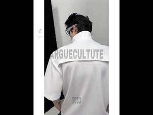 360-degree video showcase of the asymmetric collar polo shirt with airplane buckle detail