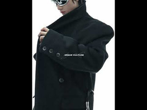 Video demonstration of how to wear and style this oversized deconstructed wool trench coat with leather accents