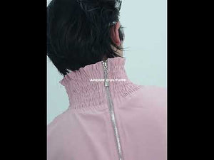 Video showcasing the premium craftsmanship and stylish details of this high-neck ruffle blouse for streetwear fashion