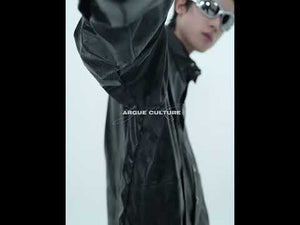 Video showing the movement and liquid effect of this deconstructed streetwear shirt with shoulder pads