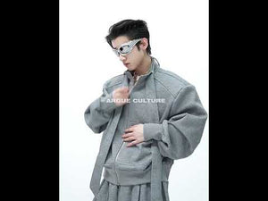 360-degree video showing tie-detail jacket and hoodie set in motion, highlighting loose fit and streetwear design