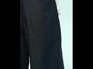 Video demonstration of vintage raw denim wide-leg pants being worn, showcasing movement and fit
