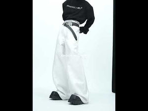 Video showing multiple ways to style these liquid-shine wide-leg trousers with different streetwear looks