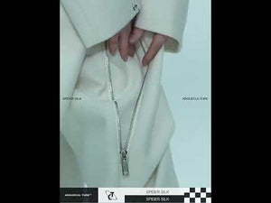 360-degree video showcasing the metal zipper details and flowy fit of these streetwear trousers