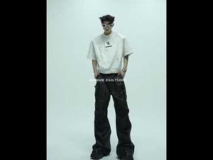 Video showcasing different ways to style this unique deconstructed metallic streetwear tee