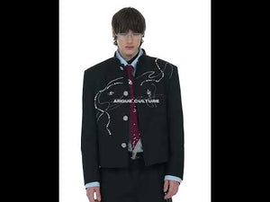 Video showcasing Chinese New Year snake print suit set with loose fit blazer and wide leg pants in motion