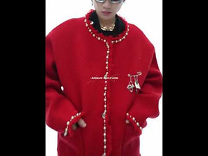 360-degree video showcasing the pearl-trimmed knit sweater's luxurious details and winter-ready warmth