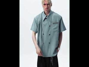 360-degree video showcase of the double-breasted summer shirt highlighting its unique collar and plaid detailing