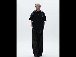 Video showing how gold sequins ripple and move on this distressed oversized streetwear t-shirt
