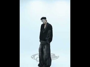 360-degree video showcasing the oversized V-neck sweater's colorblock design and fleece details