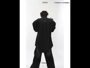 Video showcasing all the unique design features of this edgy shoulder-pad shirt with wrinkle pattern