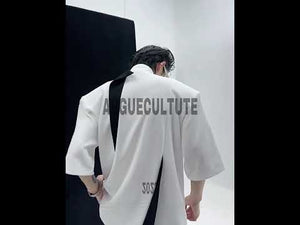 360-degree video showcasing all features of deconstructed polo shirt including square neck, metal zipper and color-block panels