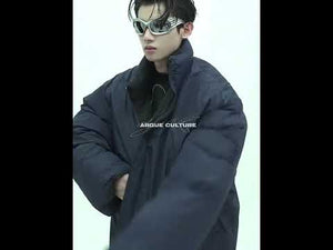 Video demonstration of the reversible puffer jacket being flipped to show both stylish sides of the winter coat