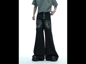 Video showing 360 degree view and walking movement of high waist wide leg glitter pants with metal buttons