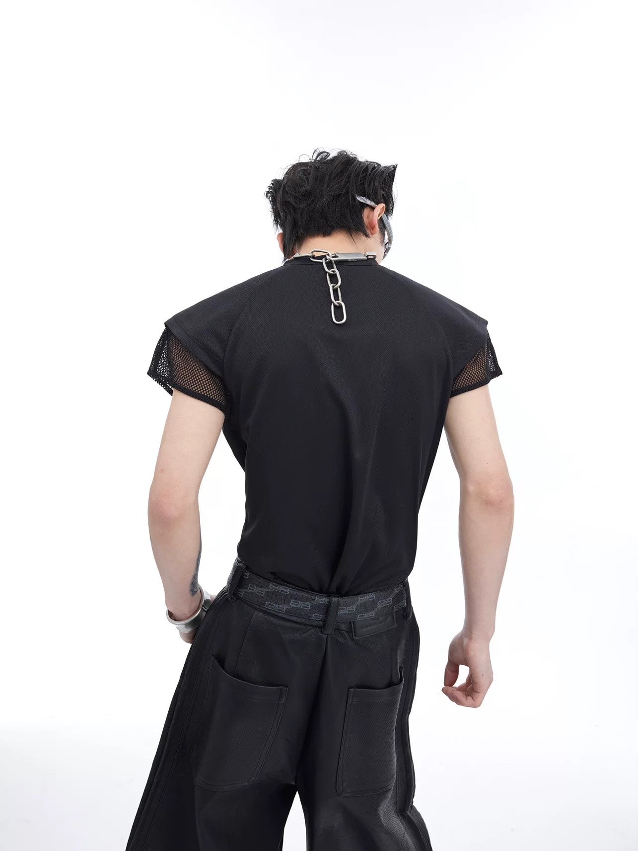 Back view of a white deconstructed mesh vest for men